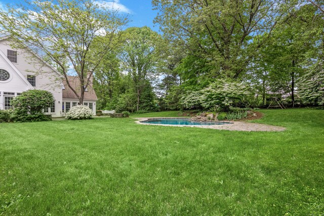 7 Merlins Ln, Newtown, CT 06470 - view of green lawn with an outdoor pool