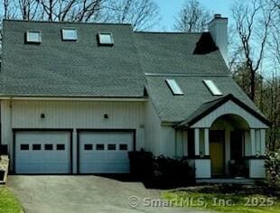 25 Hidden Pl, Cheshire, CT 06410 - view of front facade with a chimney, asphalt driveway, and a garage