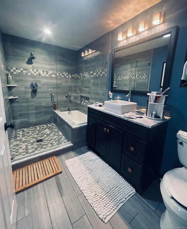25 Hidden Pl, Cheshire, CT 06410 - bathroom featuring a bath, wood finished floors, a shower stall, and vanity