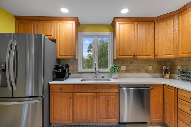 403 Bethmour Rd, Bethany, CT 06524 - kitchen with stainless steel appliances, tasteful backsplash, light countertops, brown cabinets, and recessed lighting
