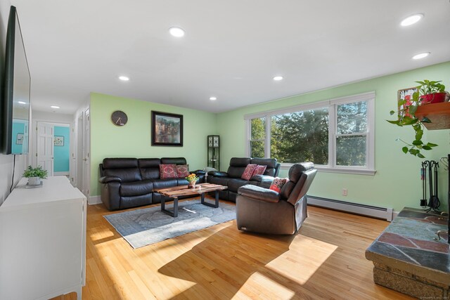 403 Bethmour Rd, Bethany, CT 06524 - living room with baseboard heating, light wood finished floors, and recessed lighting
