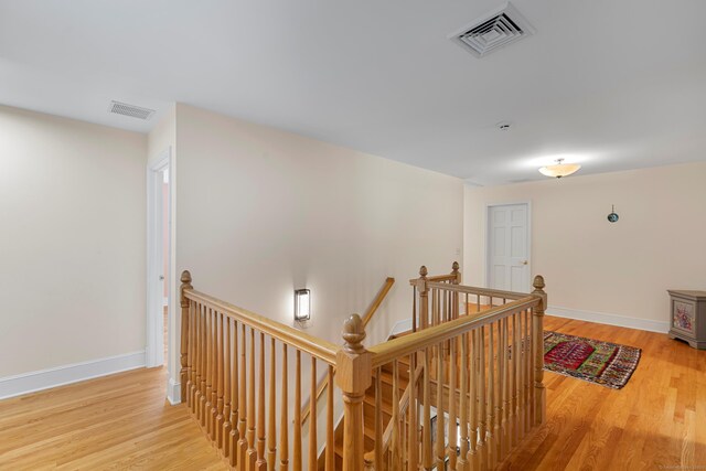 403 Bethmour Rd, Bethany, CT 06524 - corridor featuring an upstairs landing and wood finished floors