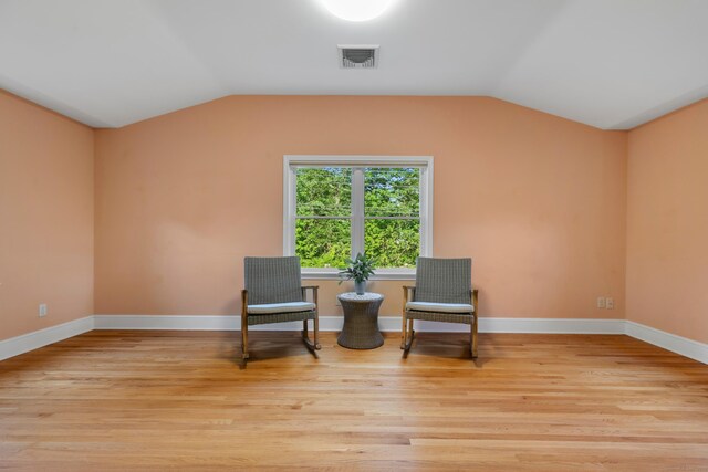 403 Bethmour Rd, Bethany, CT 06524 - sitting room with light wood-type flooring and lofted ceiling