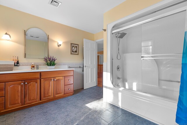 403 Bethmour Rd, Bethany, CT 06524 - full bathroom featuring  shower combination, vanity, tile walls, tile patterned flooring, and a wainscoted wall