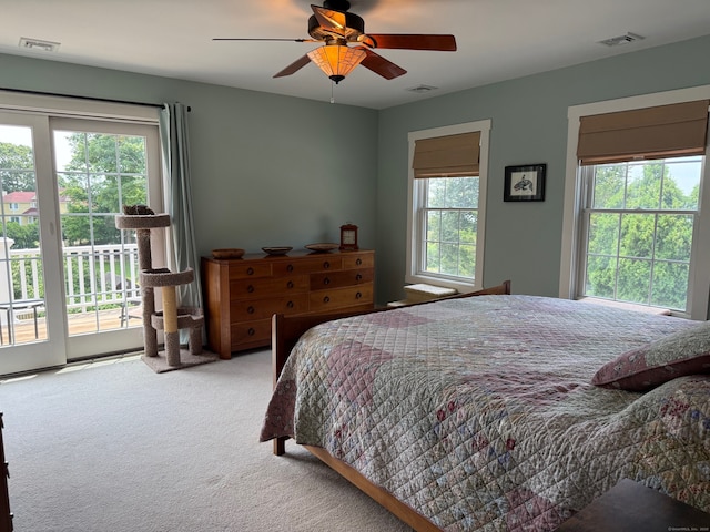 5 Lees Ct, Stonington, CT 06378 - bedroom with access to exterior, carpet floors, multiple windows, and ceiling fan