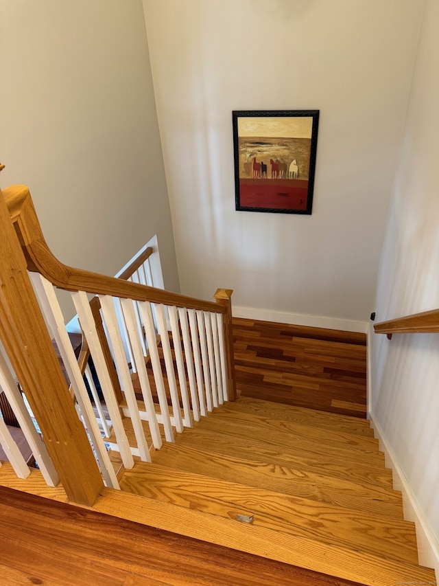5 Lees Ct, Stonington, CT 06378 - stairs featuring wood finished floors and baseboards