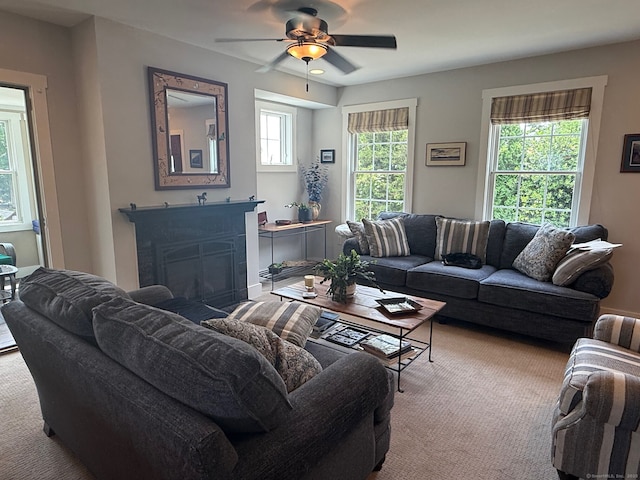 5 Lees Ct, Stonington, CT 06378 - living area with ceiling fan, carpet flooring, and a fireplace