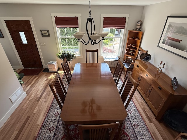 5 Lees Ct, Stonington, CT 06378 - dining room featuring light wood finished floors and plenty of natural light