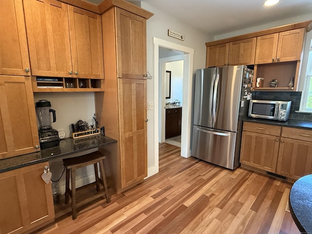 5 Lees Ct, Stonington, CT 06378 - kitchen with stainless steel appliances, open shelves, light wood-style flooring, decorative backsplash, and recessed lighting