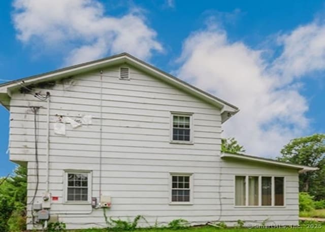 2 Rolf Dr, Danbury, CT 06810 - view of side of property featuring a yard