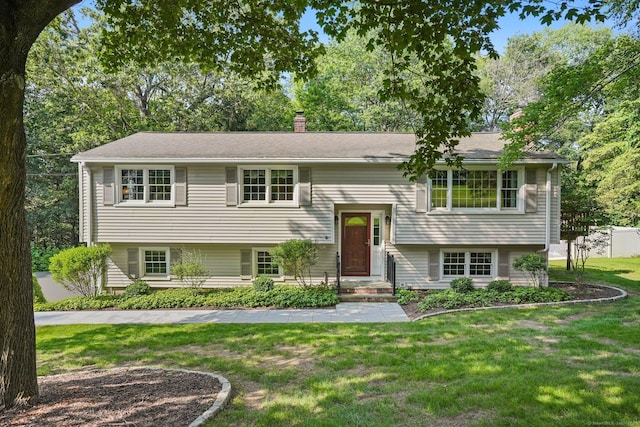 6 Robert Frost Dr, Shelton, CT 06484 - raised ranch featuring a chimney and a front yard