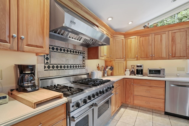6 Robert Frost Dr, Shelton, CT 06484 - kitchen featuring stainless steel appliances, exhaust hood, decorative backsplash, light countertops, and vaulted ceiling