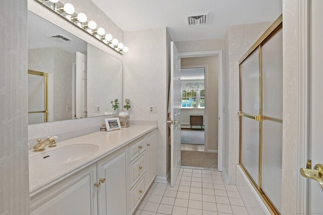 6 Robert Frost Dr, Shelton, CT 06484 - bathroom featuring vanity, tile patterned floors, and bath / shower combo with glass door
