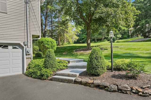 6 Robert Frost Dr, Shelton, CT 06484 - view of grassy yard featuring view of scattered trees and an attached garage