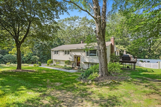 6 Robert Frost Dr, Shelton, CT 06484 - view of front of property featuring a wooden deck, a chimney, and view of wooded area