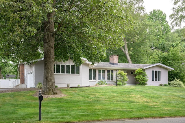 66 Del Prado Dr, Bristol, CT 06010 - ranch-style home featuring brick siding, a garage, and a chimney