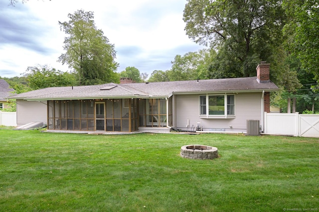66 Del Prado Dr, Bristol, CT 06010 - rear view of property with a chimney, a sunroom, and a fire pit