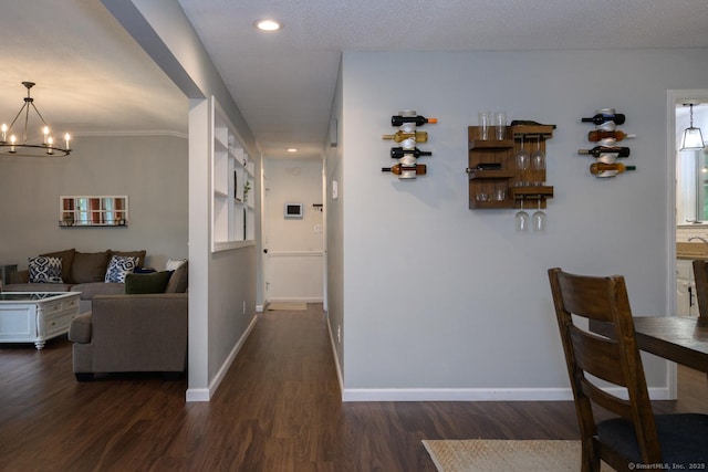 66 Del Prado Dr, Bristol, CT 06010 - hall featuring dark wood-style floors, a chandelier, and recessed lighting