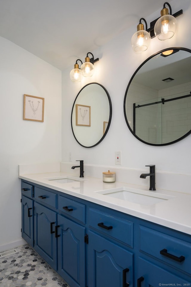 66 Del Prado Dr, Bristol, CT 06010 - bathroom featuring double vanity and tiled shower