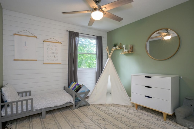 66 Del Prado Dr, Bristol, CT 06010 - bedroom with a ceiling fan and wooden walls