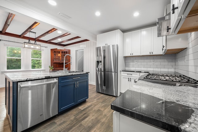 16 Pine Rd, Stafford, CT 06076 - kitchen featuring appliances with stainless steel finishes, blue cabinetry, decorative backsplash, beamed ceiling, and white cabinets