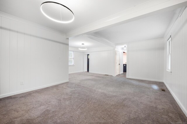 16 Pine Rd, Stafford, CT 06076 - empty room with carpet and beamed ceiling