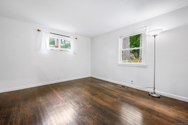 16 Pine Rd, Stafford, CT 06076 - empty room with hardwood / wood-style floors and baseboards