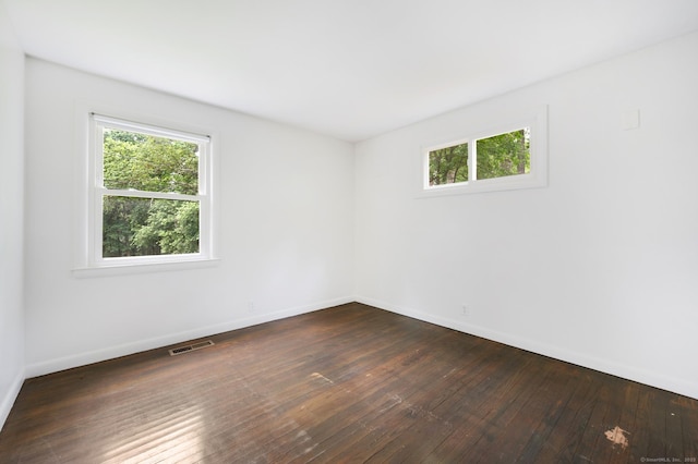 16 Pine Rd, Stafford, CT 06076 - spare room featuring healthy amount of natural light and dark wood-style floors