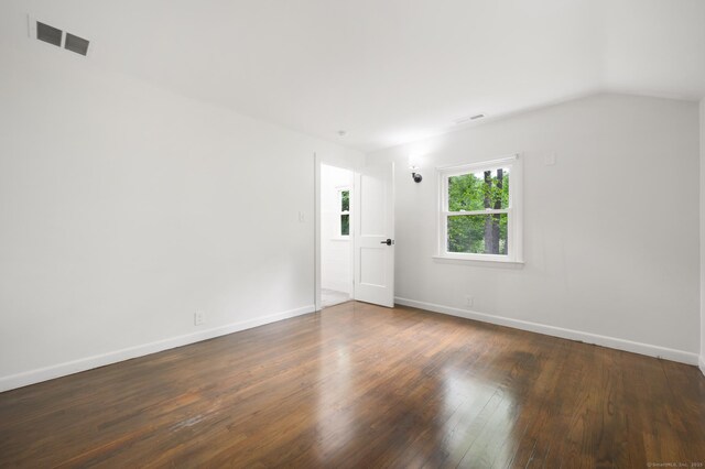 16 Pine Rd, Stafford, CT 06076 - unfurnished room featuring dark wood finished floors and lofted ceiling