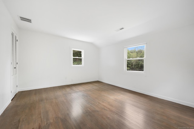16 Pine Rd, Stafford, CT 06076 - spare room featuring dark wood-style floors and baseboards