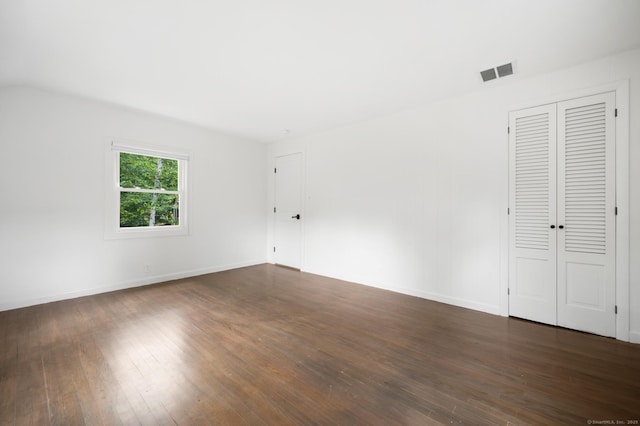16 Pine Rd, Stafford, CT 06076 - unfurnished bedroom featuring dark wood finished floors and baseboards