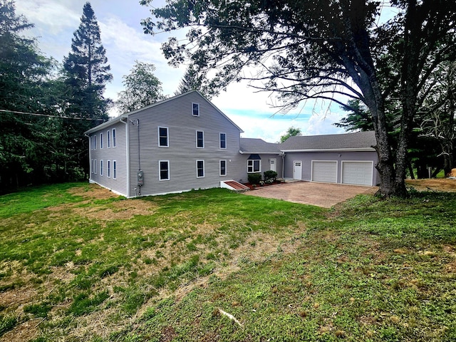 203 Old Jewett City Rd, Preston, CT 06365 - back of house featuring a yard, a garage, and driveway