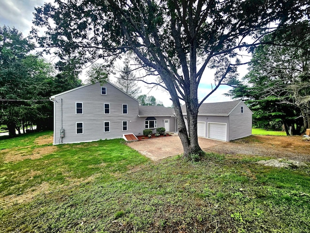 203 Old Jewett City Rd, Preston, CT 06365 - back of property featuring dirt driveway, a yard, and an attached garage