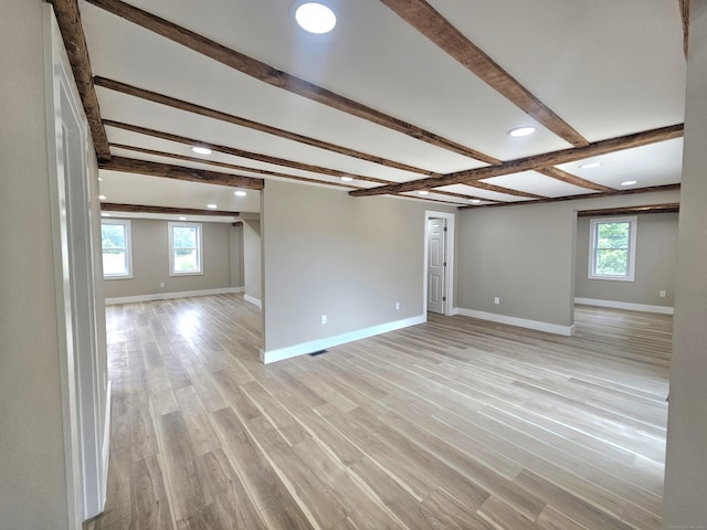 203 Old Jewett City Rd, Preston, CT 06365 - spare room featuring beamed ceiling, healthy amount of natural light, light wood-style flooring, and recessed lighting