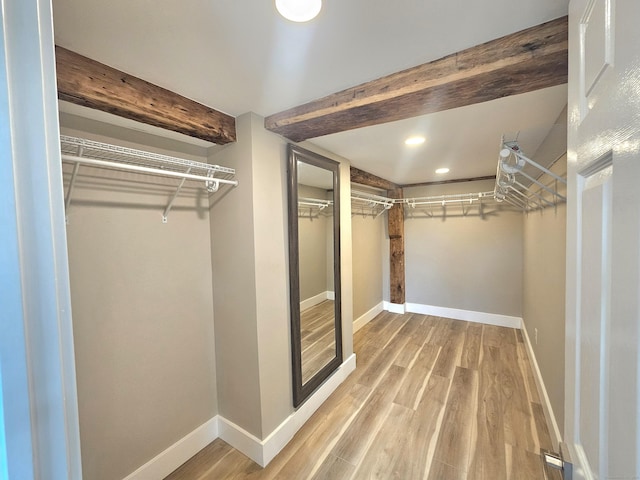 203 Old Jewett City Rd, Preston, CT 06365 - spacious closet featuring wood finished floors and beam ceiling
