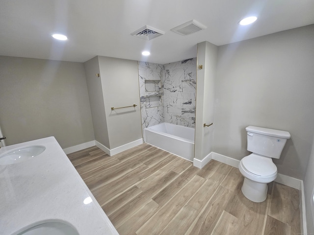 203 Old Jewett City Rd, Preston, CT 06365 - bathroom featuring vanity, wood finished floors, shower / tub combination, and recessed lighting
