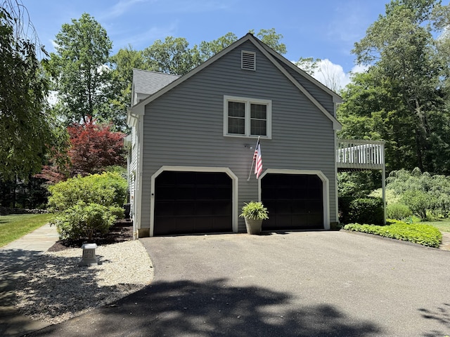 160 Cobbler Ln, Southbury, CT 06488 - view of side of property with driveway and an attached garage