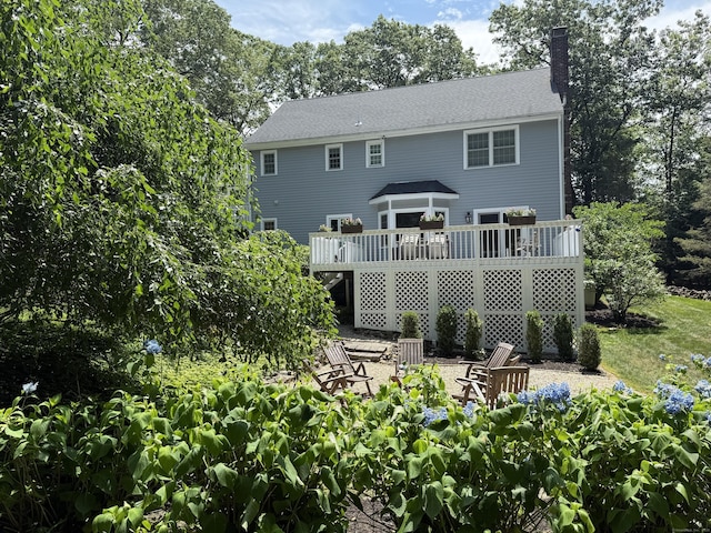 160 Cobbler Ln, Southbury, CT 06488 - rear view of property featuring a deck, a chimney, and a shingled roof