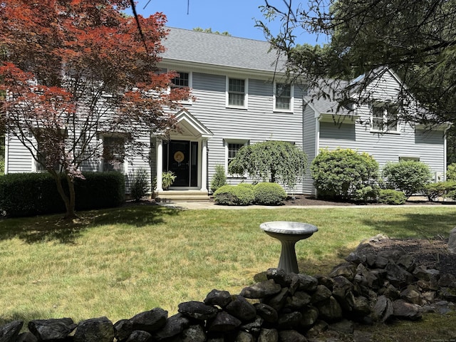 160 Cobbler Ln, Southbury, CT 06488 - view of front of property featuring a front yard and a shingled roof