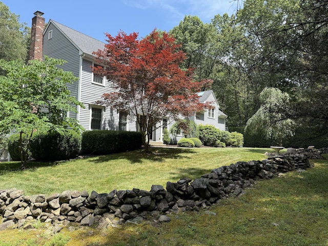 160 Cobbler Ln, Southbury, CT 06488 - view of front of home featuring a chimney and a front yard