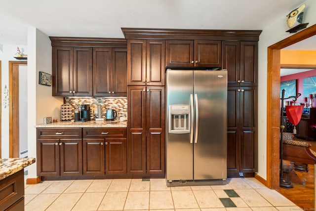 48 Greenwood Cir, Seymour, CT 06483 - kitchen with stainless steel fridge with ice dispenser, dark brown cabinetry, light stone counters, and decorative backsplash