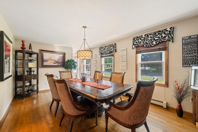 48 Greenwood Cir, Seymour, CT 06483 - dining room featuring a baseboard radiator and wood finished floors