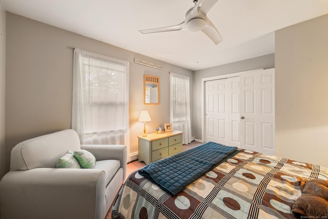48 Greenwood Cir, Seymour, CT 06483 - bedroom with a closet, a ceiling fan, a baseboard radiator, and light colored carpet