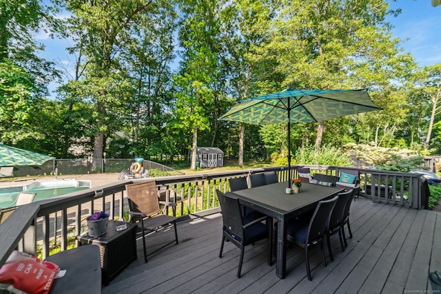 48 Greenwood Cir, Seymour, CT 06483 - deck with a shed, outdoor dining area, and view of scattered trees