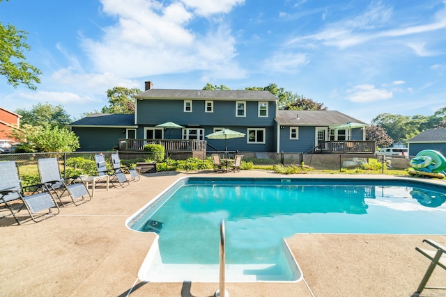 48 Greenwood Cir, Seymour, CT 06483 - view of swimming pool featuring a wooden deck and a patio area