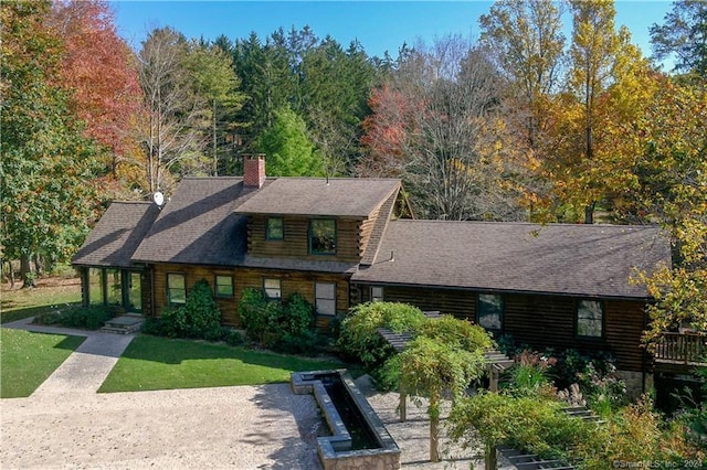 10 Firetower Rd, Killingworth, CT 06419 - log home with log siding, a chimney, a front yard, and a shingled roof