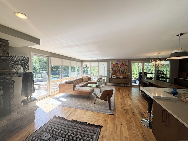 10 Firetower Rd, Killingworth, CT 06419 - living room featuring hardwood / wood-style floors and a chandelier
