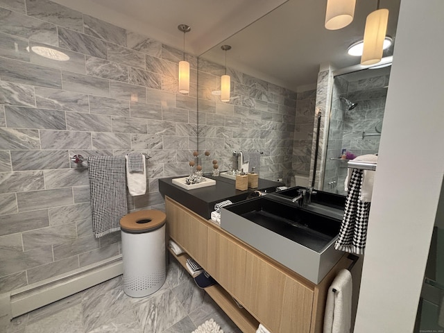 10 Firetower Rd, Killingworth, CT 06419 - bathroom with tile walls, a baseboard radiator, vanity, marble look tiles, and tiled shower