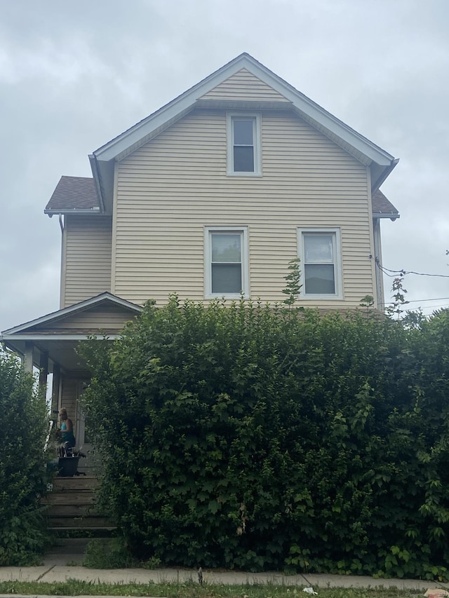 561 E St, New Britain, CT 06051 - view of side of property with a porch