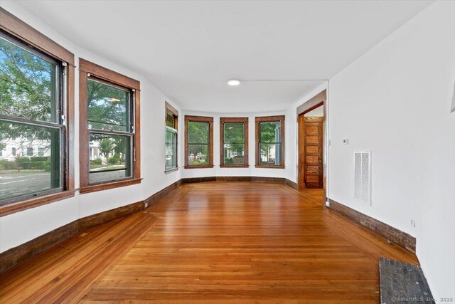 212 Maple St, New Haven, CT 06511 - spare room with baseboards and wood finished floors